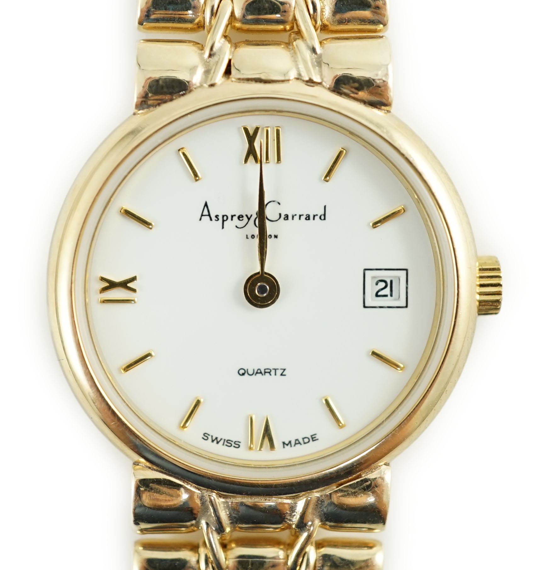 A lady's 2002 9ct gold Asprey & Garrard quartz wrist watch, on a 9ct gold bracelet